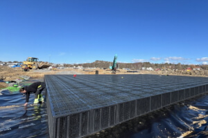 Påbörjat dagvattenmagasin med geomembran i plast vid Grebbestad Camping
